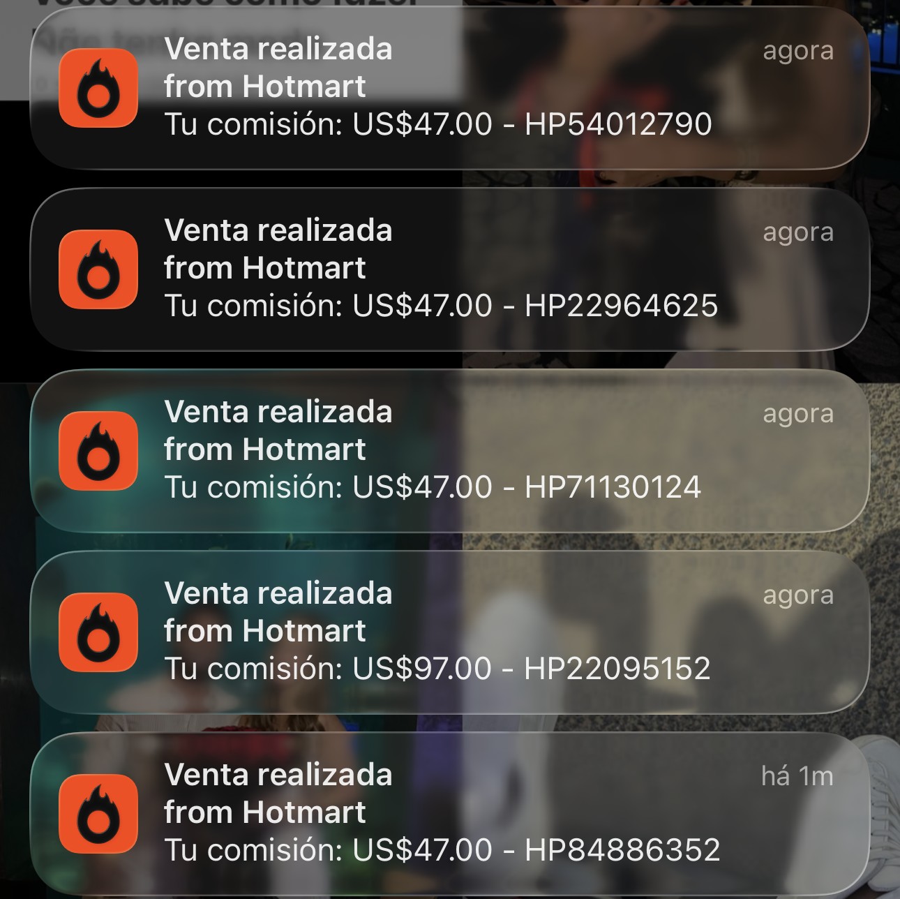 Pantalla bloqueada con notificaciones reales de Hotmart: Venta realizada — Tu comisión: US$ 47.00, US$ 47.00, US$ 47.00, US$ 97.00, US$ 47.00
